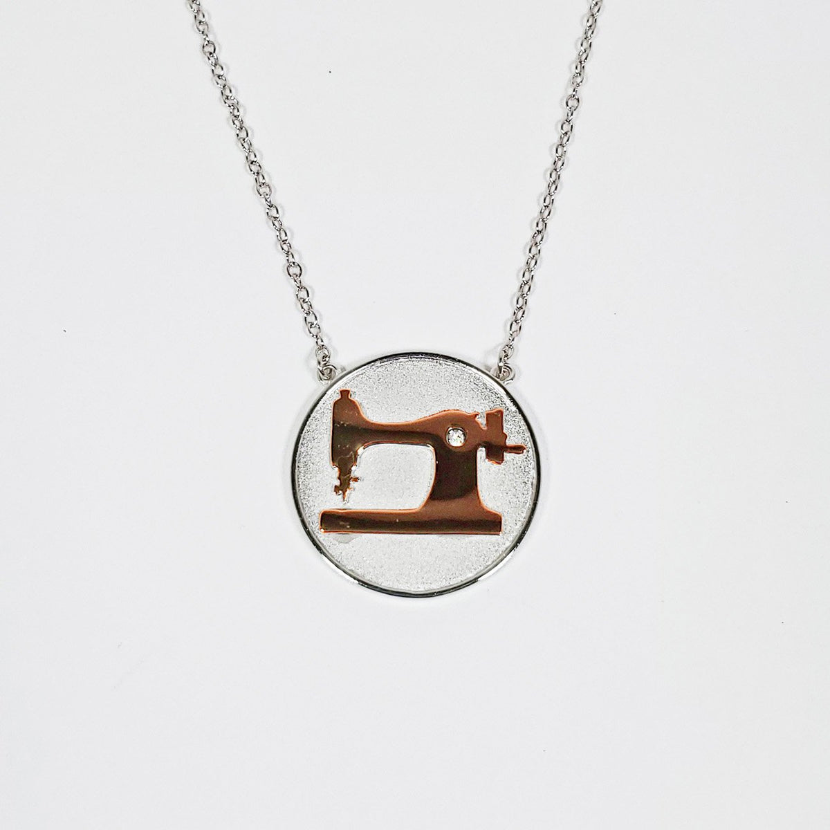 Sewing machine coin necklace – The Common Thread